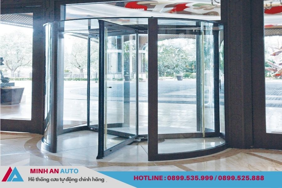 Mẫu Cửa Tự Động Mở Quay Cánh Cong Khung Inox Cao Cấp